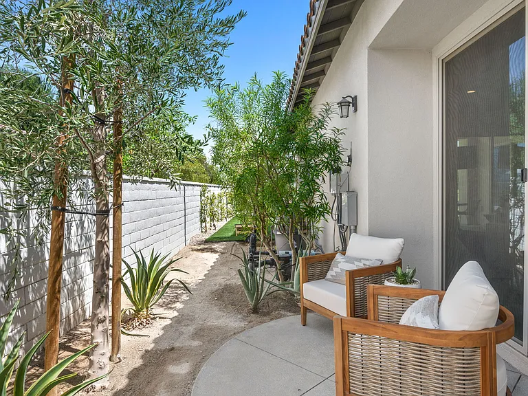 Are you seeking quiet time? The seating area for two just behind the slider door is available for you to unwind and read a book outdoors without any interruptions!