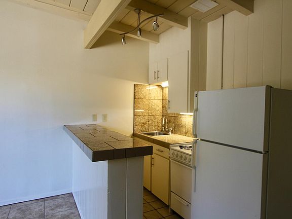 Kitchen with storage under the bartop