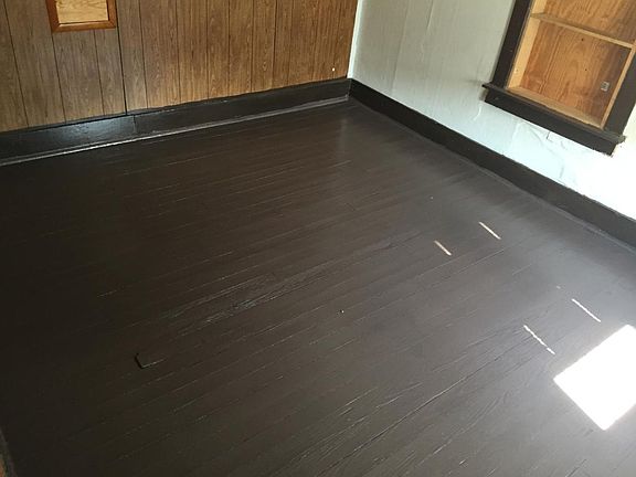 Bedroom with built in bookshelves