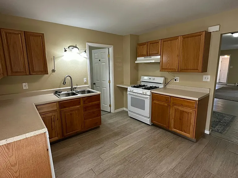 Kitchen (with small bedroom off to the left)