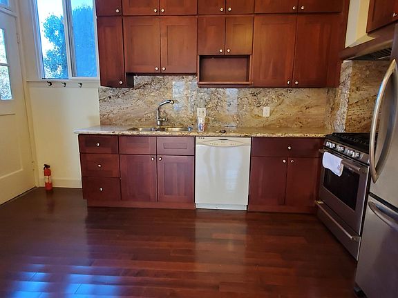 Kitchen with very tall cabinets