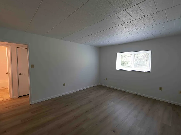Larger Bedroom with LVP flooring