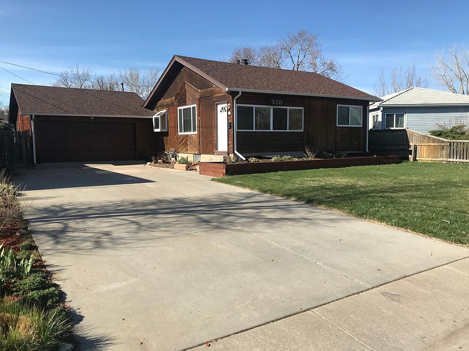 Front of the house. The garage is oversized and easily accommodates two full-sized cars with room in the back for storage.