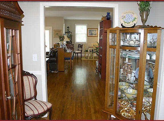 Gleaming hardwoods greet you in the foyer and throughout the house...
