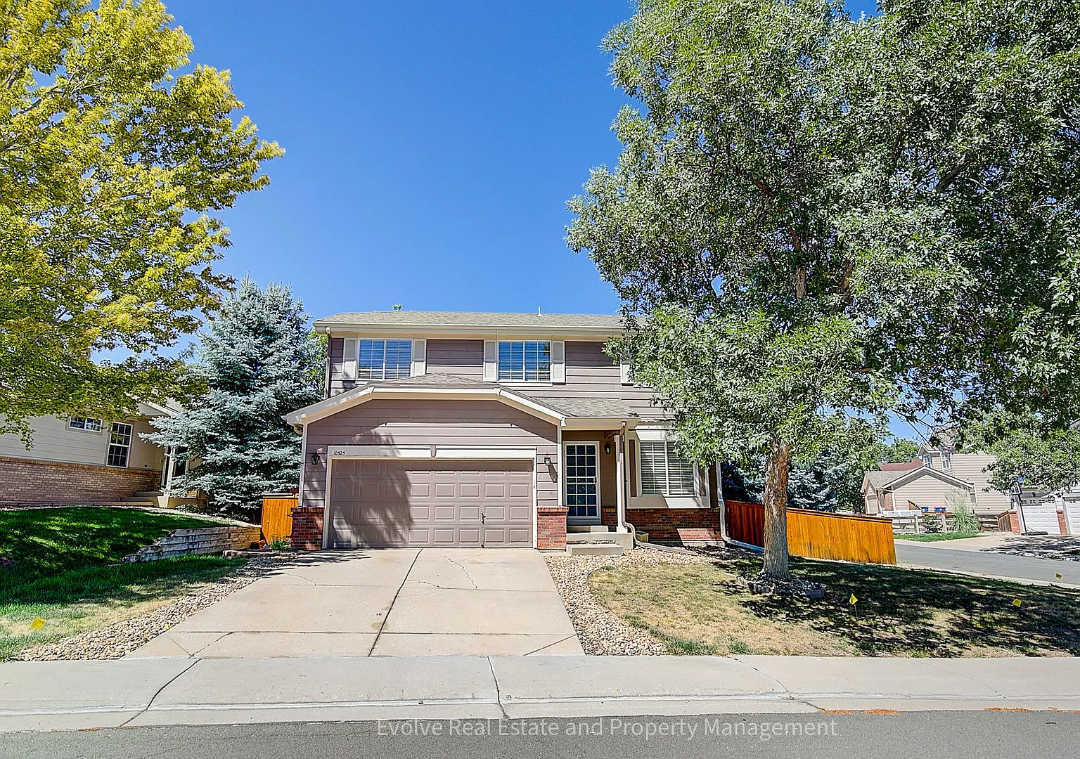 Evolve Real Estate: Beautiful 4-Bedroom Home in Lone Tree with Finished Basement! Available Septe... — Photo 1