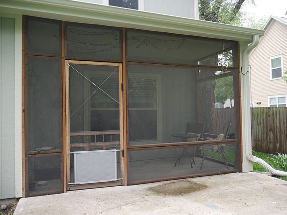 Screened porch in backyard