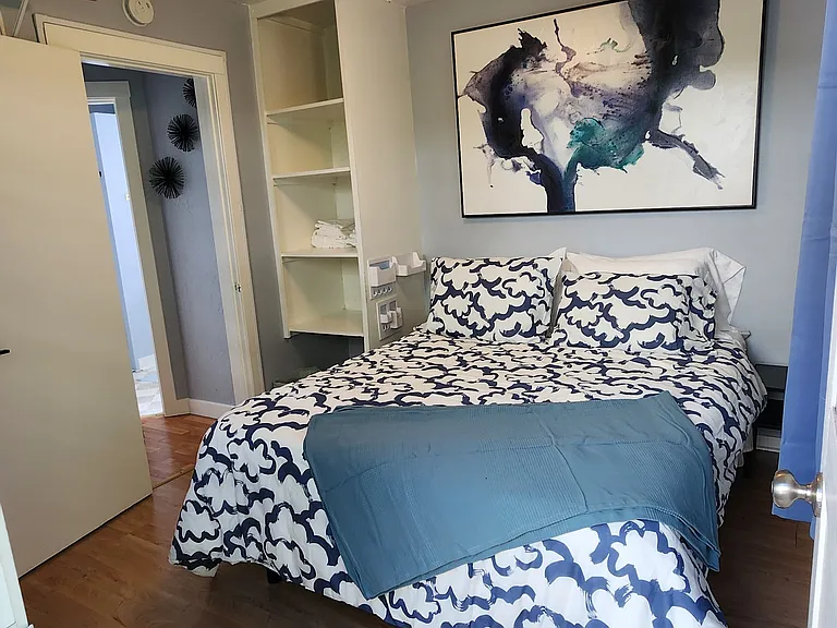 The upstairs bedroom has a door leading to the patio that can be used as a private entrance. The bedroom is large enough for two to sleep comfortably. The home is delivered unfurnished.