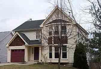 Front of Home with walkway to the back of the home where the In Laws Suite is located.