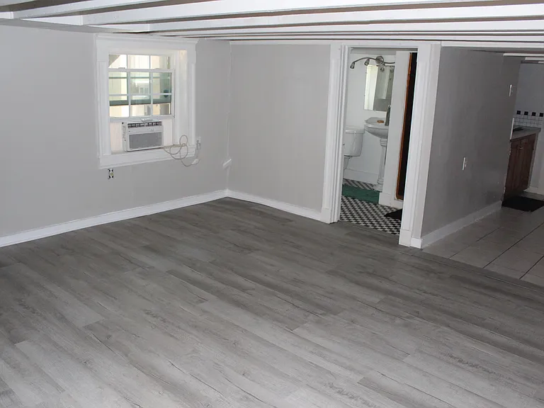 Large bedroom with new flooring