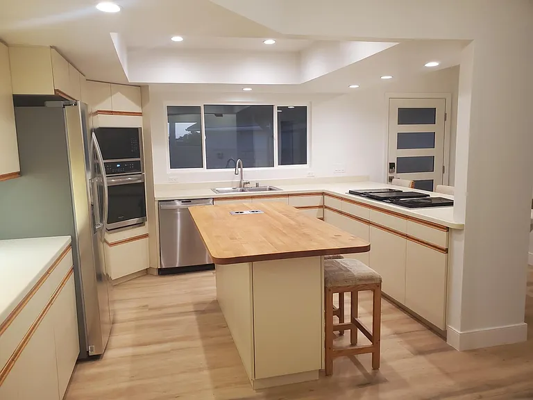 New stainless appliances. Large kitchen with island.
