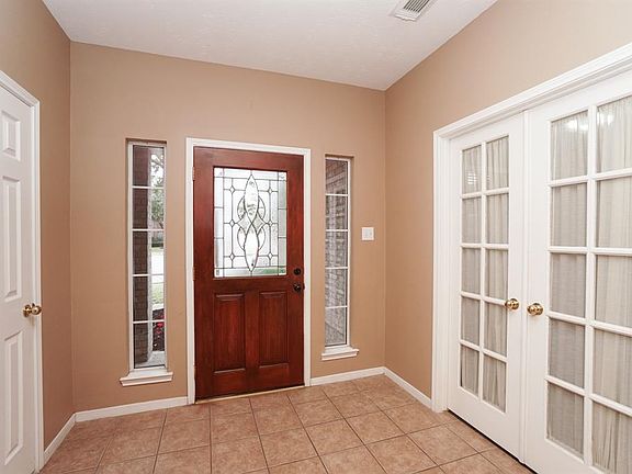 Beautiful leaded glass front door welcomes friends and family