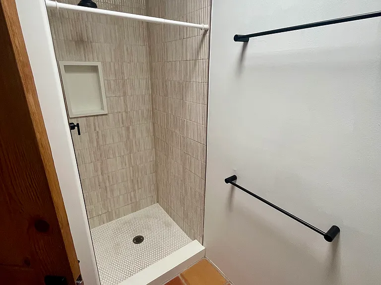 Second bathroom with updated shower.