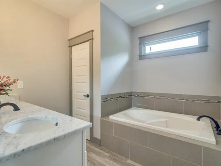 Primary Bathroom, with large double shower head walk in shower