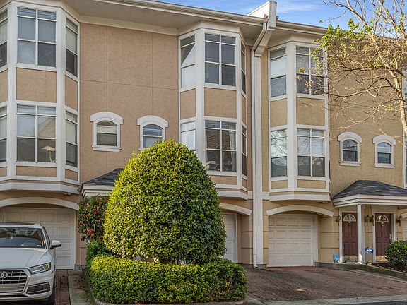 Front of unit with garage view