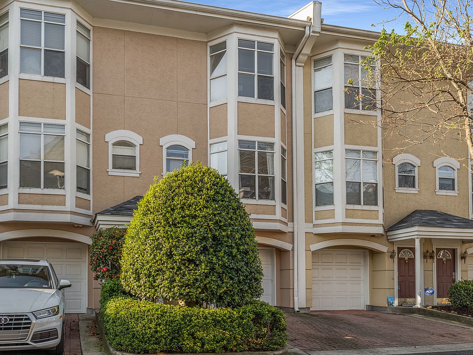 Front of unit with garage view