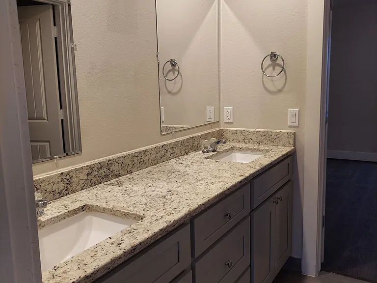 full bath upstairs, accessible from both bedrooms (referred to as a Jack & Jill bathroom)