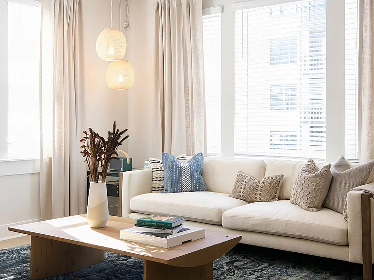 Cozy living room with giant windows and modern finishes