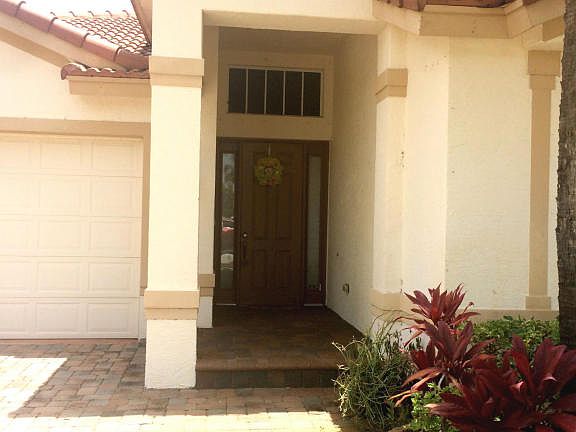 Home For Sale In Portofino Isles
