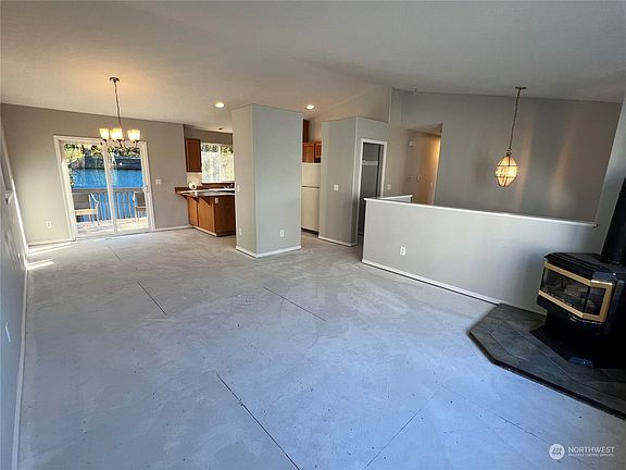 Freshly painted throughout with designer colors...so many choices for your flooring. The spacious open living area looks onto the deck and back yard.>