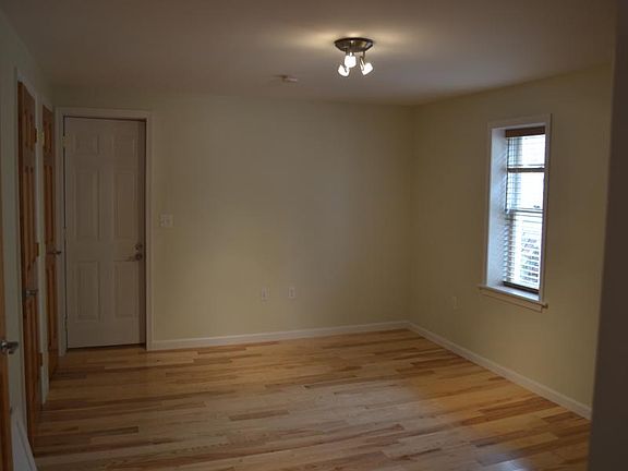 Bedroom with closet and laundry