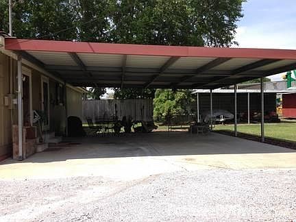 2 car carport/patio : Extra double lean on property for camper, utility trailer, etc.