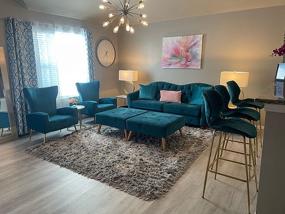 spacious living room and breakfast bar area