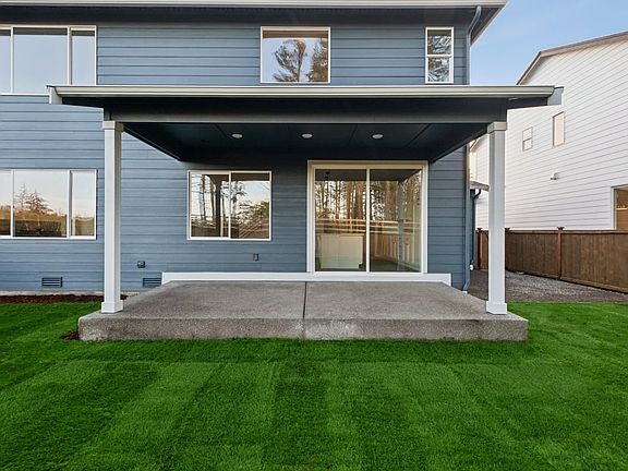 Covered Outdoor Living and Fenced Rear Yard
