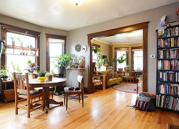 Great dining room with lots of sunlight and original hardwood floors