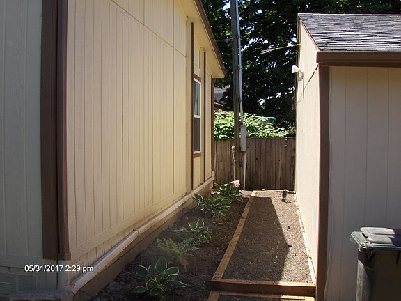space between house & garage