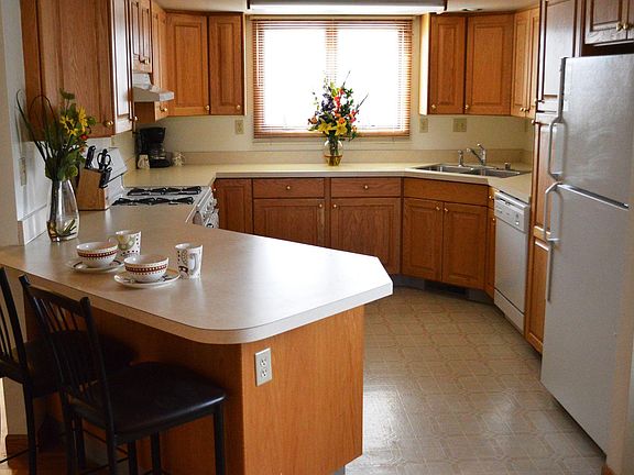 Kitchen with lots of cabinet space and a pantry for storage.