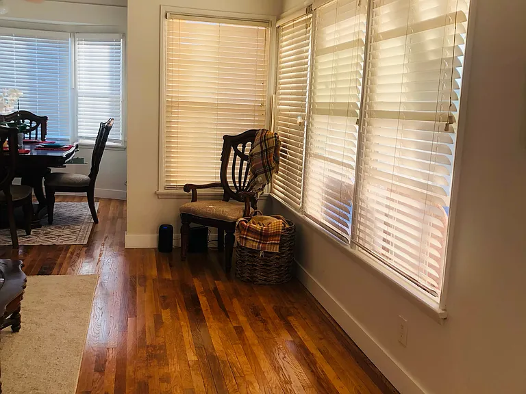 All windows have blinds as there are several windows for fresh air and ample lighting throughout the room