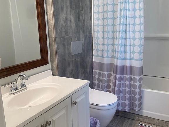 Full bath - tub/shower combo, sink with plenty of cabinet space