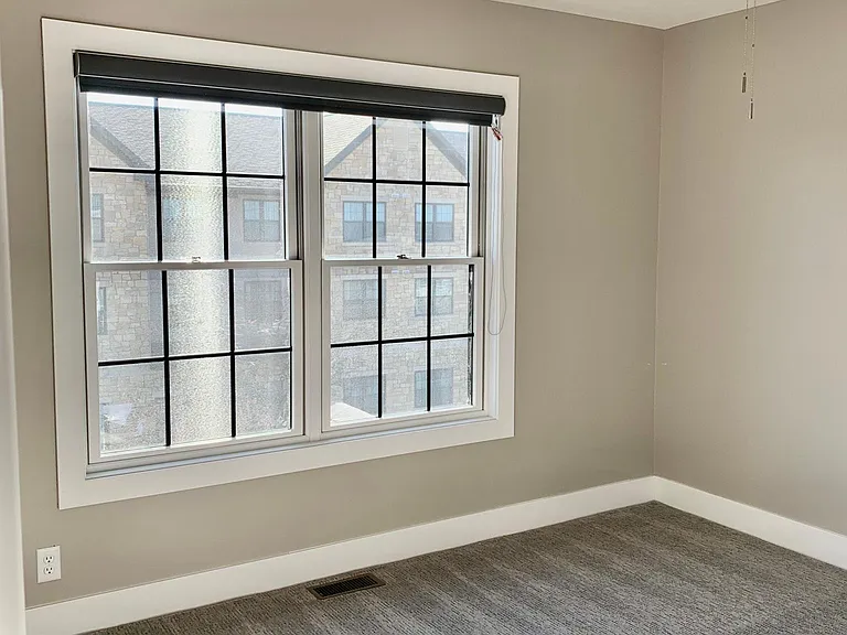 Large window in second bedroom