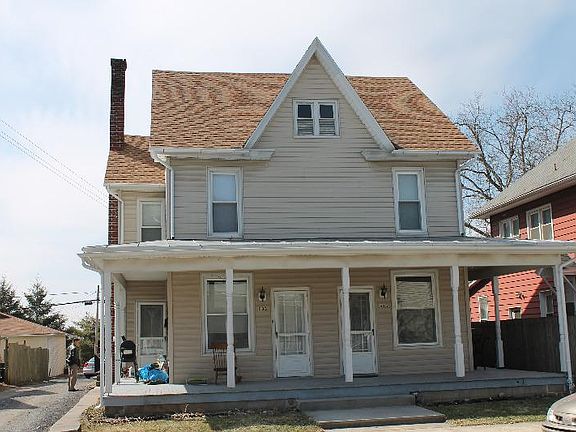 New roof, new siding, new windows, and a lovely porch!