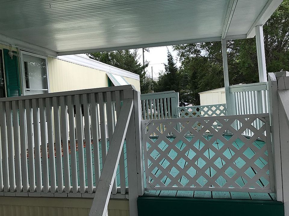Porch under Roof off Carport