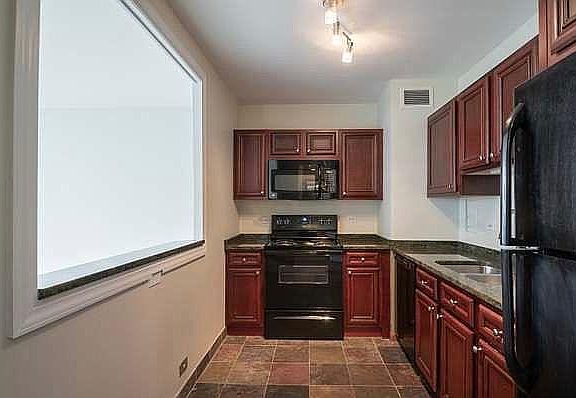 Ample kitchen space, with updated appliances.