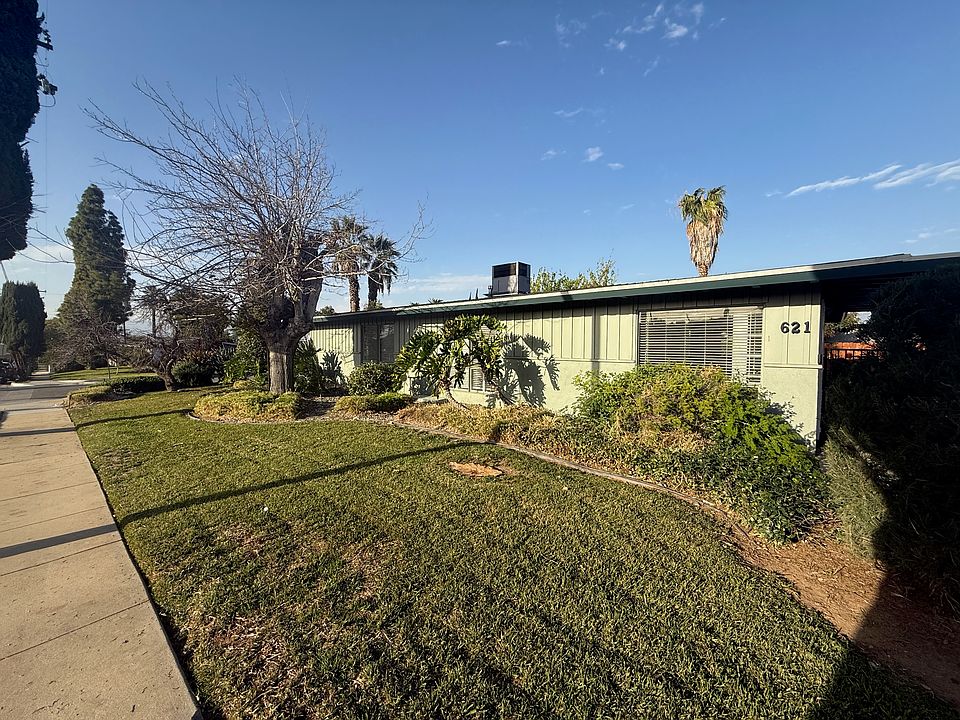 FRONT EXTERIOR FULLY LANDSCAPED