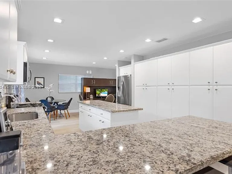 7711 Coquina Dr — Photo 13