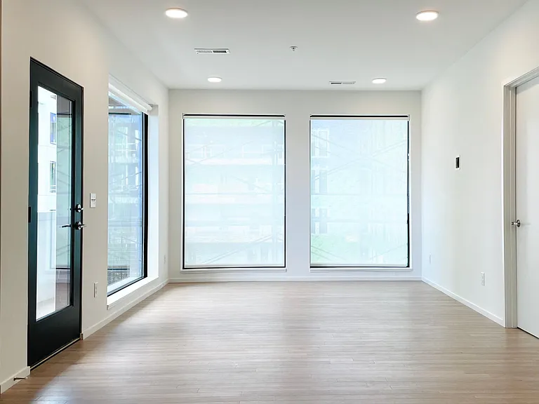 Open concept Living Space Attached to kitchen