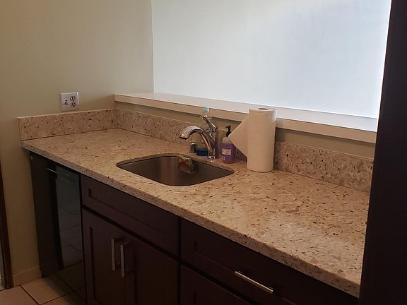 Other side of kitchen looking into living room.