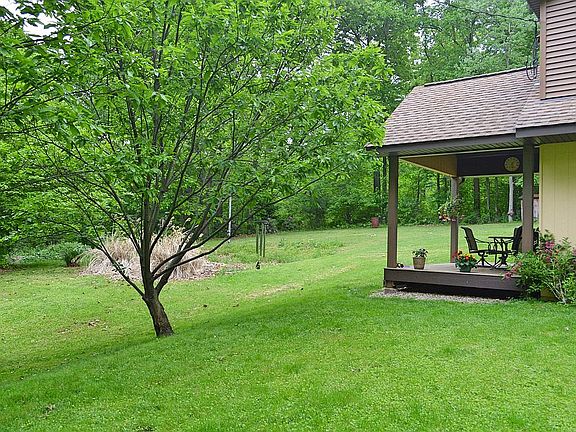 Side yard and covered deck