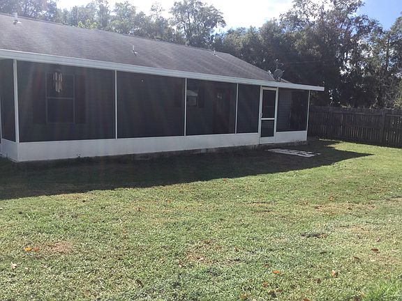 Private fenced screen lania in backyard