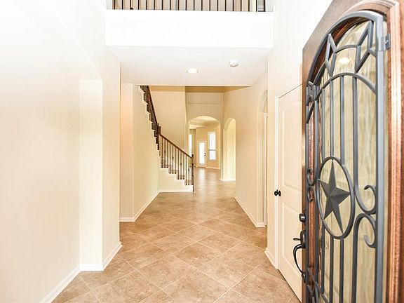 Wrought-iron at front door & interior stair railing