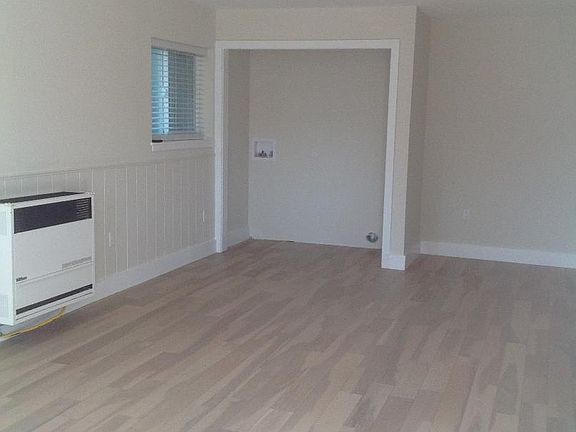 Living room with Laundry Hook ups.