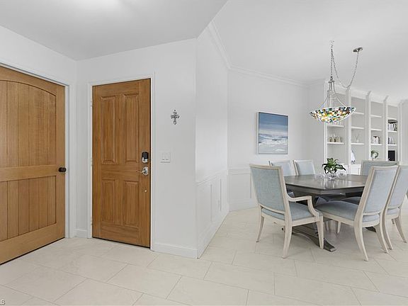 5th image of 7040 Pelican Bay Blvd APT 401