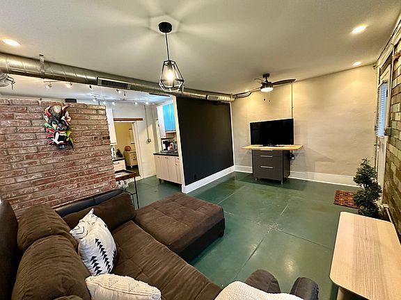 Living room view towards kitchen.