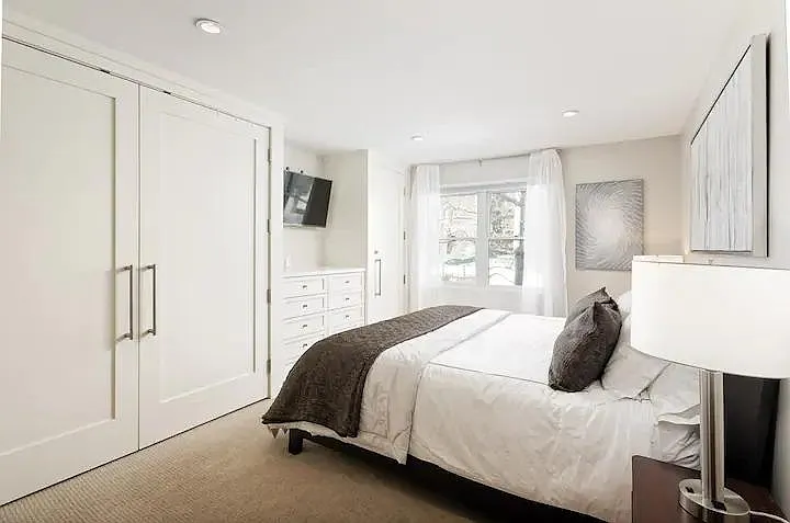 Primary bedroom with mountain views.