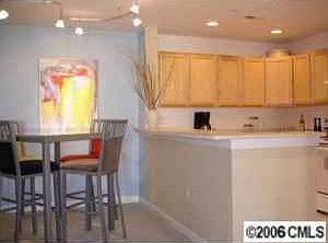 Kitchen - different lighting, cabinets, and colors now