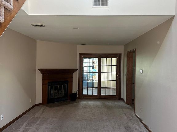 living room, fireplace with vaulted ceilings