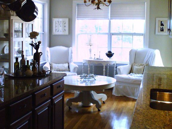 Kitchen features granite counter tops, island, stainless steel applicances, dual fuel gas range with electric oven.